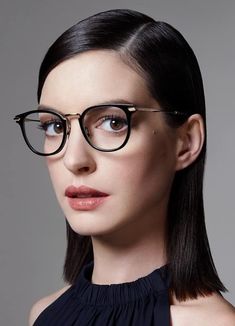 a woman with glasses on her face