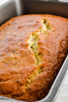 a loaf of bread in a metal pan