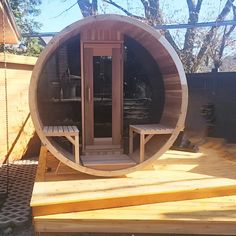 a hot tub sitting on top of a wooden deck