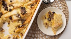 a white dish filled with bread and raisins next to a bowl full of raisins