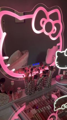 a hello kitty lighted vanity mirror in a room