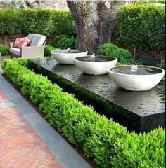 an instagram page with two bowls on top of a water feature in the middle