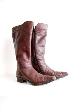 Vintage dark red leather boots with warm lining.Listed Size: EU: 36 US: 5.5  UK: 3.5  (Please check the measurements with something that fits you)Measurements:Length: 14''/ 36cm (boots length)Length: 9" / 22cm ( inside the sole, from tip of the toe to the back of the heel)Heel Height: 1" / 2.5 cmWIDTH: 3.5" / 9 cmPlease check measurements to insure a proper fit. Remember to allow yourself some extra room for movement. You can compare these with something from your closet that fits you well.These Dark Red Boots, Brown Vintage Boots, Red Leather Boots, Beige Hat, Vintage Cowboy Boots, Boots Cowboy, Genuine Leather Boots, Western Boots Women, Red Boots