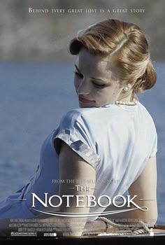 a movie poster for the notebook with a woman in white dress sitting on a boat