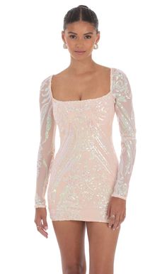 Iridescent Sequin Long Sleeve Dress in Peach | LUCY IN THE SKY Glamorous Fitted Sequin Dress For Spring, Fitted Sheer Sequin Dress For Spring, Spring Embellished Sequin Stretch Dress, Fitted Contrast Sequin Mini Dress For Spring, Fitted Mini Dress With Contrast Sequin For Spring, Glamorous Sequin Stretch Dress For Spring, Glamorous Spring Sequin Dress With Stretch, Pink Fitted Long Sleeve Sequin Dress, Fitted Sheer Sequin Cocktail Dress