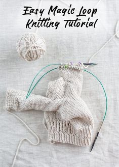 an easy magic lop knitting pattern is shown with yarn and scissors on the table