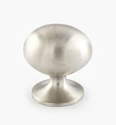 a metal knob on a white background