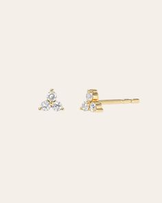 14k yellow gold diamond trio stud earrings—a luxurious gift for yourself or a loved one. These timeless and classic studs provide an exquisite diamond bouquet in a secure prong setting, perfect for every day or night! Sold as a Single or Pair Diamond Carat Weight: Approx. 0.13 ctw each Total Weight: 1 gram Size of Trio: Approx. 4mm (W) Standard Production: 7-12 business days Rush Order Production: 5-8 business days Shipping: Select shipping method at checkout. Shipped from our L.A. Studio. This Diamond Bouquet, Long Diamond Earrings, Dainty Gold Earrings, Gold Sunburst, Cartilage Earrings Stud, Simple Stud Earrings, Diamond Gift, Star Earrings Stud, Bezel Set Diamond