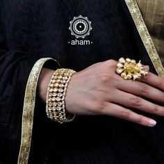 Handcrafted festive silver bracelet with gold polish, kundan work and embellished cultured pearls. 
The price is for one piece kada only.#ahamjewellery #silverjewellery #925silver #goldpolish #weddingcollection #goldonsilver #indiansilverjewellery #ethnicjewellery #traditionalindianjewellery #jaipur #aham #curatedjewellery #handcraftedjewelry #everydaystyle #giftsforher #womanfashion #kundanwork #goldplated #goldplatedjewelry #kundanjewellery #goldplatedsilverjewelry Kundan Work