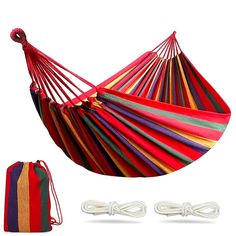 a colorful hammock with two drawsacks next to it