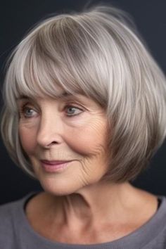 For women over 70, the stylish silver bob with wispy bangs is a choice. This short hairstyle gracefully combines modernity and sophistication for those with fine or thin hair. Click here to check out more flattering hairstyles for women over 70. Bob With Wispy Bangs, Silver Bob, Angled Hair, 70 Style, Flattering Hairstyles, Bob Hairstyles With Bangs, Hair Styles For Women, Grey Hair Styles For Women