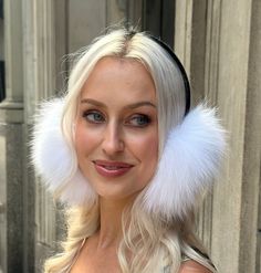 ABOUT THIS ITEM: Introducing our luxurious White Real Fox Fur Earmuffs, a must-have accessory for winter! Made from 100% upcycled natural fur, these earmuffs are stunning! With a plush mix of natural Fox Fur covering the ears and soft velvet on the band, they provide the perfect blend of elegance, comfort, and warmth. These earmuffs are designed for all-day wear without any pressure on your head or ears. They're incredibly warm and fluffy, perfect for chilly days when you want to stay cozy and s White Winter Hats With Ear Flaps, White Winter Hats As Gifts, Fluffy Winter Hat, Fur Earmuffs, Winter Event, Leather Skin, White Fur, Functional Accessories, Winter Mode