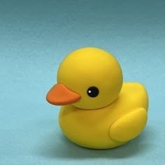 a yellow rubber duck sitting on top of a blue surface