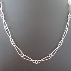 This Chains item by sherrybsilverstudio has 2 favorites from Etsy shoppers. Ships from Allentown, PA. Listed on Aug 26, 2024 Handmade Chains Jewelry, Sterling Silver Link Chain Necklace, Handmade Chain Jewelry, Silver Soldering, Handmade Silver Chain, Chain Types, Neck Art, Chain Link Necklace Silver, Contemporary Jewellery Designers