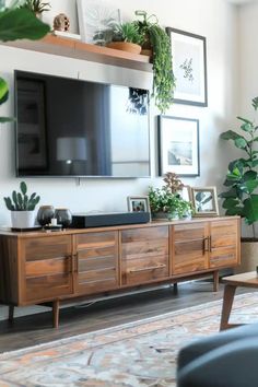 Walls In Living Room Decorating, Mid Century Modern Living Room Tv Wall, Tv Cabinet With Floating Shelves, Living Room Wall With Tv Decor Ideas, Asymmetrical Tv Wall Decor, Floating Shelves Over Tv Living Rooms, Wall Shelves Under Tv, Tv Wall Open Shelves, Shelves And Art On Wall