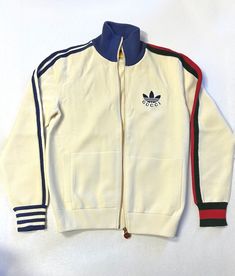 Gucci Casual Winter Track Jacket, Gucci Casual Track Jacket For Winter, Casual Gucci Winter Track Jacket, Casual Long Sleeve Gucci Track Jacket, Gucci Sporty Streetwear Outerwear, Gucci Sporty Outerwear For Streetwear, Sporty Gucci Outerwear For Streetwear, Gucci Long Sleeve Track Jacket For Winter, Gucci Long Sleeve Track Jacket For Fall