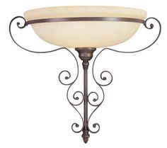 a light fixture with a white glass bowl on it's arm and an ornate metal frame