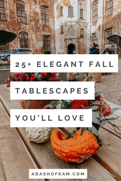 an orange pumpkin sitting on top of a wooden table with text overlay reading 25 elegant fall tablescapes you'll love