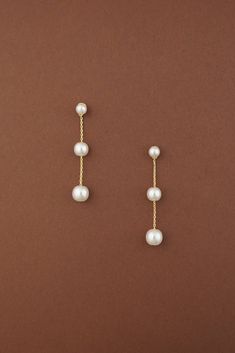 Meet our dainty and elegant *NEW* CALLIE Pearl Drop Earrings, a perfect blend of elegance and sophistication with a modern touch. These dainty earrings feature three pearls sized 5mm, 6mm, and 7mm. Whether you’re dressing up for a special occasion or adding a touch of refinement to your everyday look, these earrings will complement any outfit with their timeless charm. Handcrafted with the Highest Quality Natural Colored Faux Pearls Platinum plated - Guards against scratches and tarnish. approxi Pearl Drop Earrings Wedding, Pearl Drop Earrings Bridal, Pearl Wedding Earrings, Drop Earrings Wedding, Pearl Bridal Earrings, Rose Gold Tiara, Bridal Hair Combs Pearl, Pearl Drop Earrings Gold, Crystals Earrings