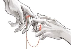 two hands are touching each other over a string