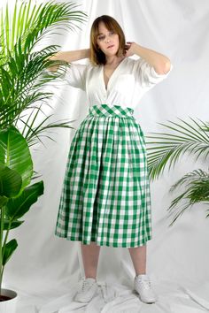 Green check high waist full gathered skirt. Perfect for casual outfits and special ocasions with pair of trainters or high heels. 100% cotton.  Elastic at the back of waist.  Two side pockets. Midi lenght about 70cm + 5 cm waistband. Handmade in UK.  Model wears size S.  HOW TO CHOOSE A SIZE ?   Using a measuring tape, measure the smallest part of your waist.  SIZE CHART: (CM) XS - W: 66 CM S - W: 70 CM M - W: 74 CM  L - W: 78 CM  XL - W: 82 CM  CARE INSTRUCTIONS: Hand wash only, do not bleach, Summer Plaid Pleated Skirt, Classic Midi-length Bottoms For Summer, Plaid Cotton Lined Skirt Bottoms, Fitted Cotton Skirt For Picnic, Plaid Cotton Skirted Bottoms, Plaid Cotton Long Skirt, Summer Plaid Pleated Bottoms, Plaid Long Cotton Skirt, Spring Plaid Pleated Skirt