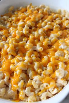 a white bowl filled with macaroni and cheese