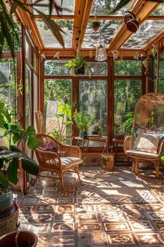 a sun room filled with lots of plants and furniture