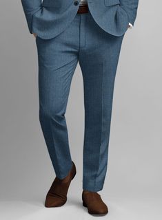 No matter where you live, work, or travel – Our Indigo Blue Pure Linen Suit is an ideal wear for any summer day. Tailored from linen in 40s Lea, the suit is light and breathable; linen absorbs a large volume of moisture, making it the perfect fabric for blistering heat or suffocating humidity. The linen suit fits perfectly well with any occasion while adding a snappy summer versatility to your wardrobe. 
 
 Look Includes  Indigo Blue Pure Linen Fabric  Two Button Jacket Style  Notch Lapel  Horn Slim Fit Linen Suits With Notch Lapel, Slim Fit Linen Suit With Notch Lapel, Semi-formal Slim Fit Linen Suits, Tailored Summer Suits For Business Casual, Tailored Summer Business Casual Suits, Summer Tailored Business Casual Suits, Blue Linen Suit For Workwear, Blue Linen Suit For Work, Blue Linen Suits For Business Casual