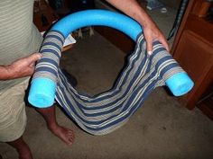 a man is holding an inflatable object