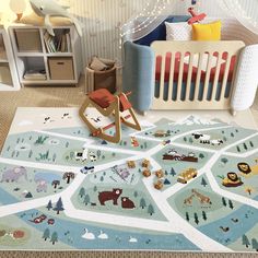 a child's room with a map and toys on the floor