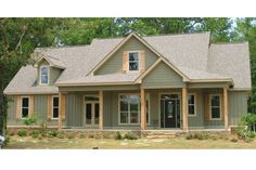 a large house with lots of windows in the front