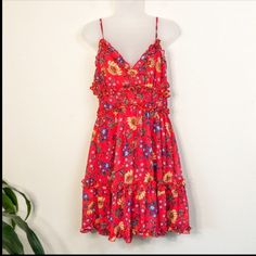 Absolutely Gorgeous Red Floral Dress.. With Ruffled Detail And Zippered Back.. I'm So Upset It Doesn't Fit. I Should Have Gotten Better Measurements So Here They Are. 14" At The Underbust 30" From Top Of Bust To Hem. 100% Polyester... Zero Stretch. Red Summer Party Sundress, Flirty Red Floral Print Dress, Red Fitted Sundress With Ruffles, Red Sundress Mini Dress For Spring, Red Sundress For Spring, Red Sundress For Spring Party, Red Party Sundress For Spring, Red Floral Print Summer Mini Dress, Red Ruffled Sundress For Party