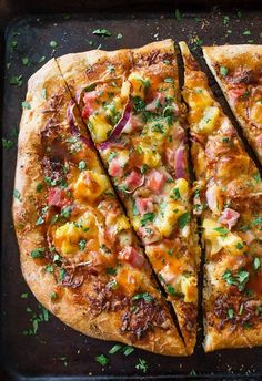 two slices of pizza sitting on top of a pan