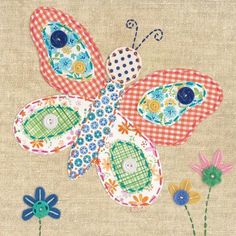 an embroidered butterfly with flowers on it