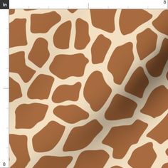 a giraffe pattern is shown in brown and white