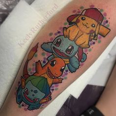 an arm with some cartoon characters on it