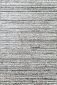 an area rug with grey and white stripes