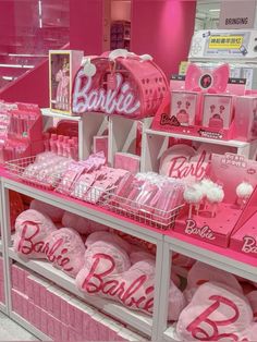 a display in a store filled with lots of pink items