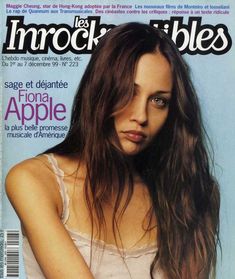 a woman with long hair on the cover of an article in french magazine imockables