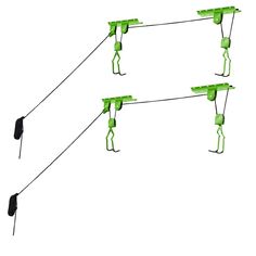 three green handles are attached to two black handles on the same string, and one is hanging from an electrical wire