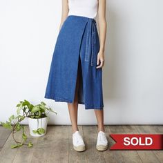 Brand New! Midi Wrap Skirt That Ties Up At The Waist With An Open Split In A Classic Blue Denim Fabric. Cotton Mid-rise Denim Skirt For Day Out, Cotton Dark Wash Skirt For Day Out, Mid-rise Cotton Denim Skirt For Day Out, Casual Indigo Cotton Denim Skirt, Casual Indigo Denim Skirt In Cotton, Chic Blue Relaxed Fit Denim Skirt, Chic Blue Denim Skirt With Relaxed Fit, Casual Indigo Denim Skirt, Relaxed Fit Denim Skirt For Day Out