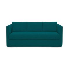 a teal colored couch against a white background