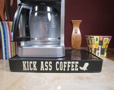 a coffee maker sitting on top of a counter