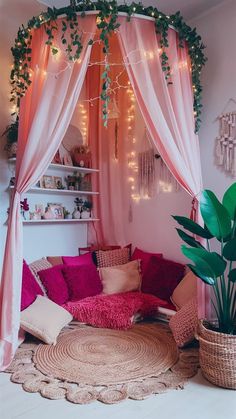 a living room filled with lots of pink and green furniture next to a potted plant