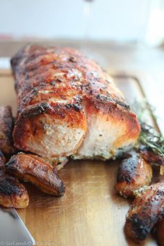 a close up of a chicken on a cutting board