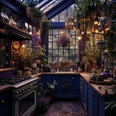 a kitchen filled with lots of potted plants next to a stove top oven under a skylight