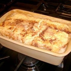 a casserole dish sitting on top of a stove