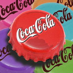 a bottle cap with the word coca - cola on it in different colors and shapes