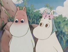 two cartoon characters standing next to each other in front of trees and rocks with flowers on their heads