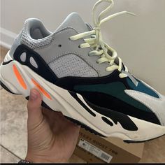 Yeezy 700 Wave Runner Gray Custom Sneakers With Boost Midsole For Jogging, Adidas Sneakers With Branded Heel Counter For Streetwear, Gray Low-top Sneakers With Branded Heel Counter, Adidas Sneakers With Vented Sides For Streetwear, Modern Gray Sneakers With Vented Sides, Dream Shoe, Wave Runner, Pretty Shoes Sneakers, All Nike Shoes